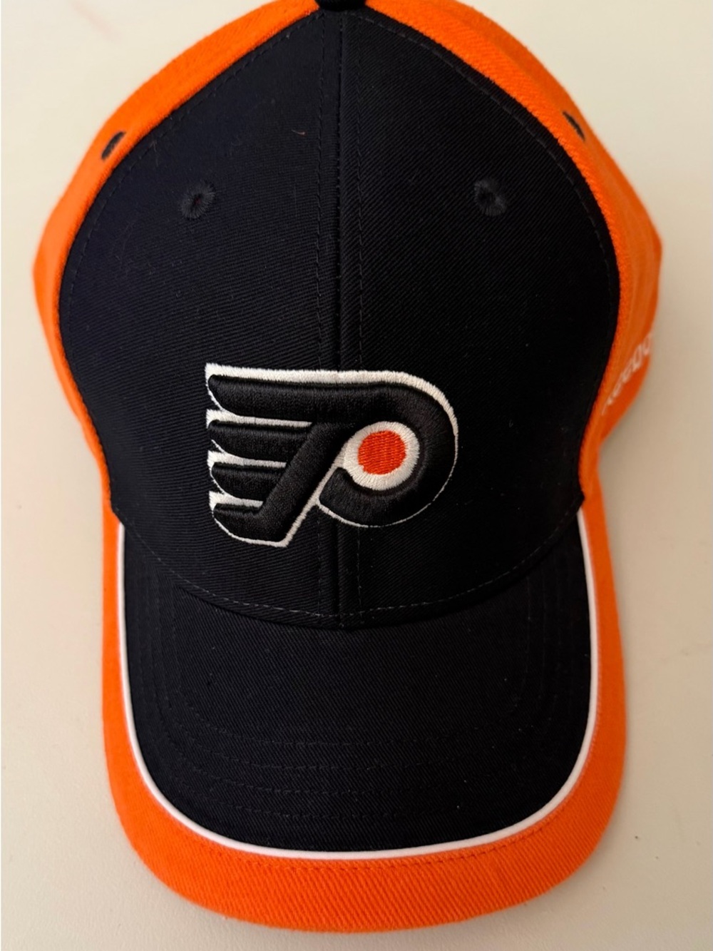 Reebok Black and Orange Philadelphia Flyers Logo Cap